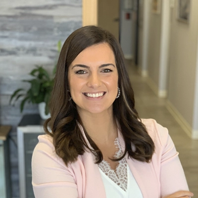 A headshot of Dr. Rachel Franco, a chiropractor at Flow of Life.