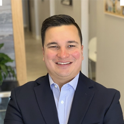 A headshot of Dr. Tony Franco, a chiropractor at Flow of Life.